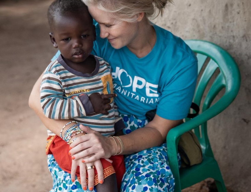 From building tower gardens to teaching women’s health classes in Uganda, Meghan Moore Wood ’95 is making a difference around the world. 